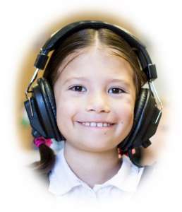 Picture of girl listening with headphones.